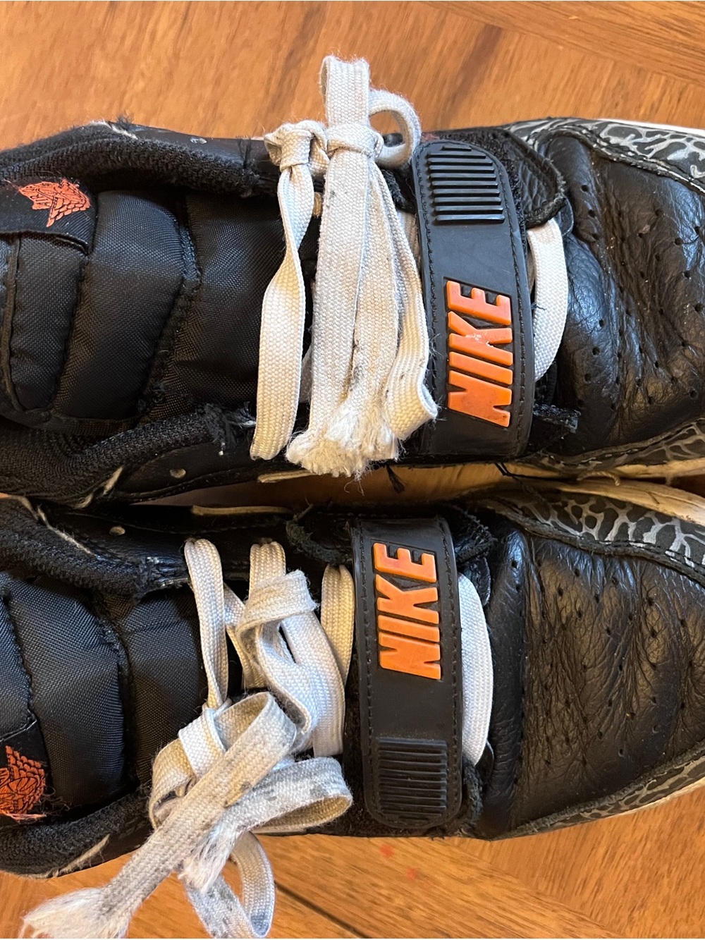 Nike Kids Black and Orange Strap Sneakers with White Laces